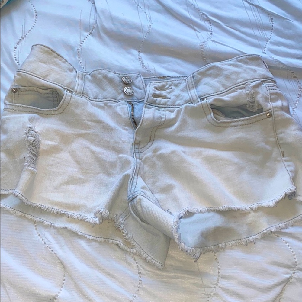 Distressed jean booty shorts